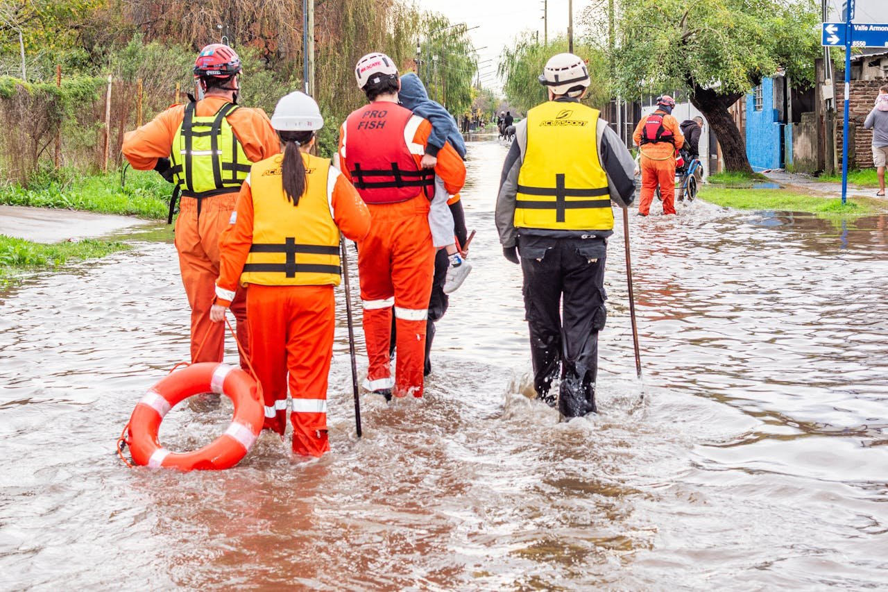 Crafting Captivating Headlines: Your awesome post title goes here Rescue team evacuates flood victims in Buenos Aires. Humanitarian aid at work.